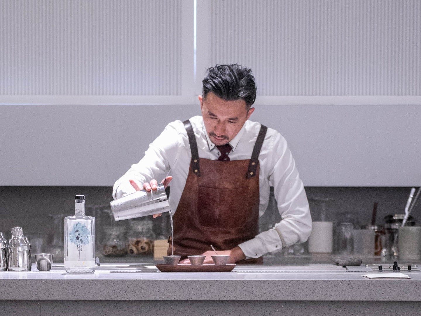 Immerse yourself in the art of gin tasting at Tankyu Distillery where expert bartenders guide you through a fusion of traditional and modern flavors in an inviting space.